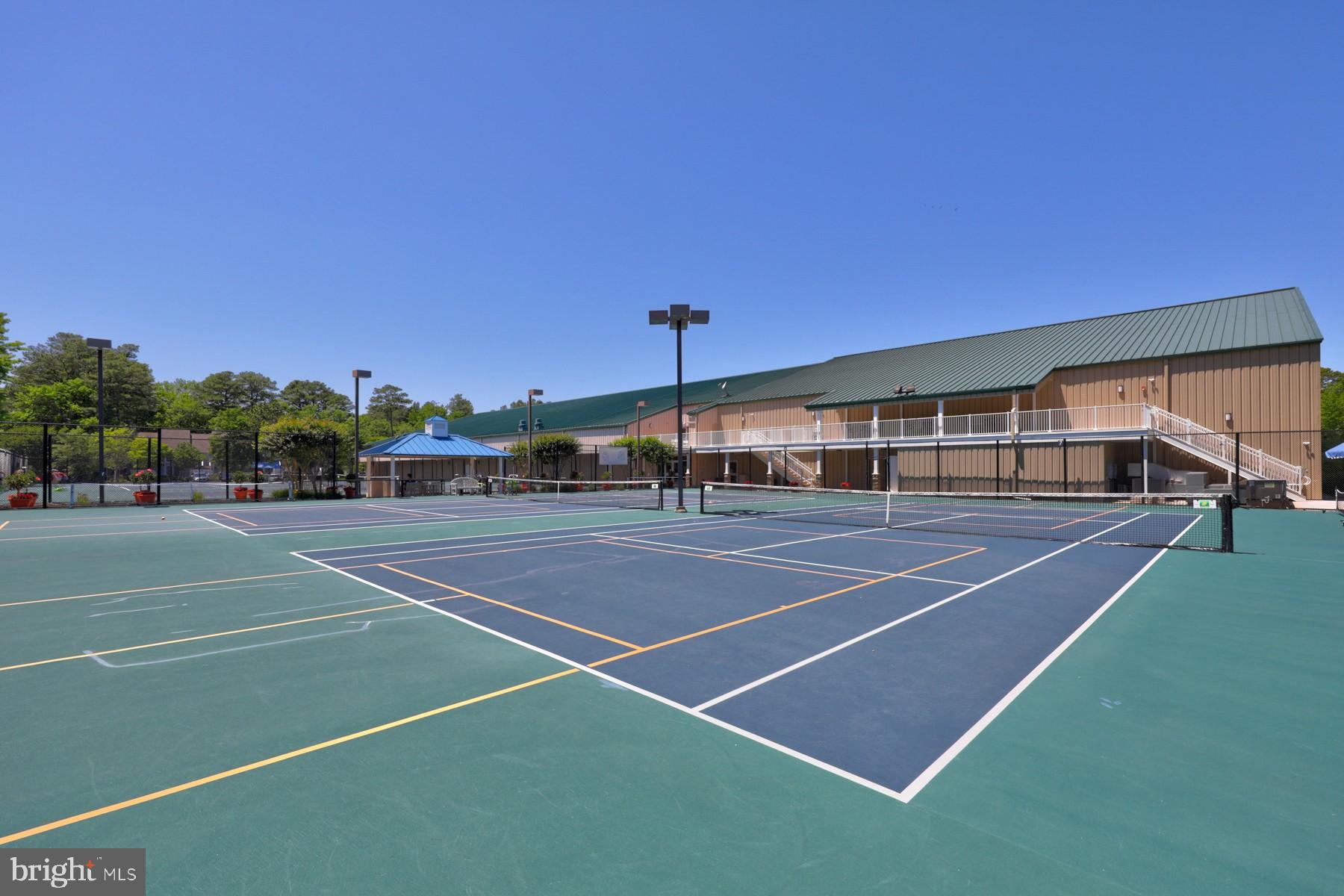 604 Dover House Road, Unit 604S Bethany Beach, DE 19930 - Photo 42 of 43 a view of a tennis court
