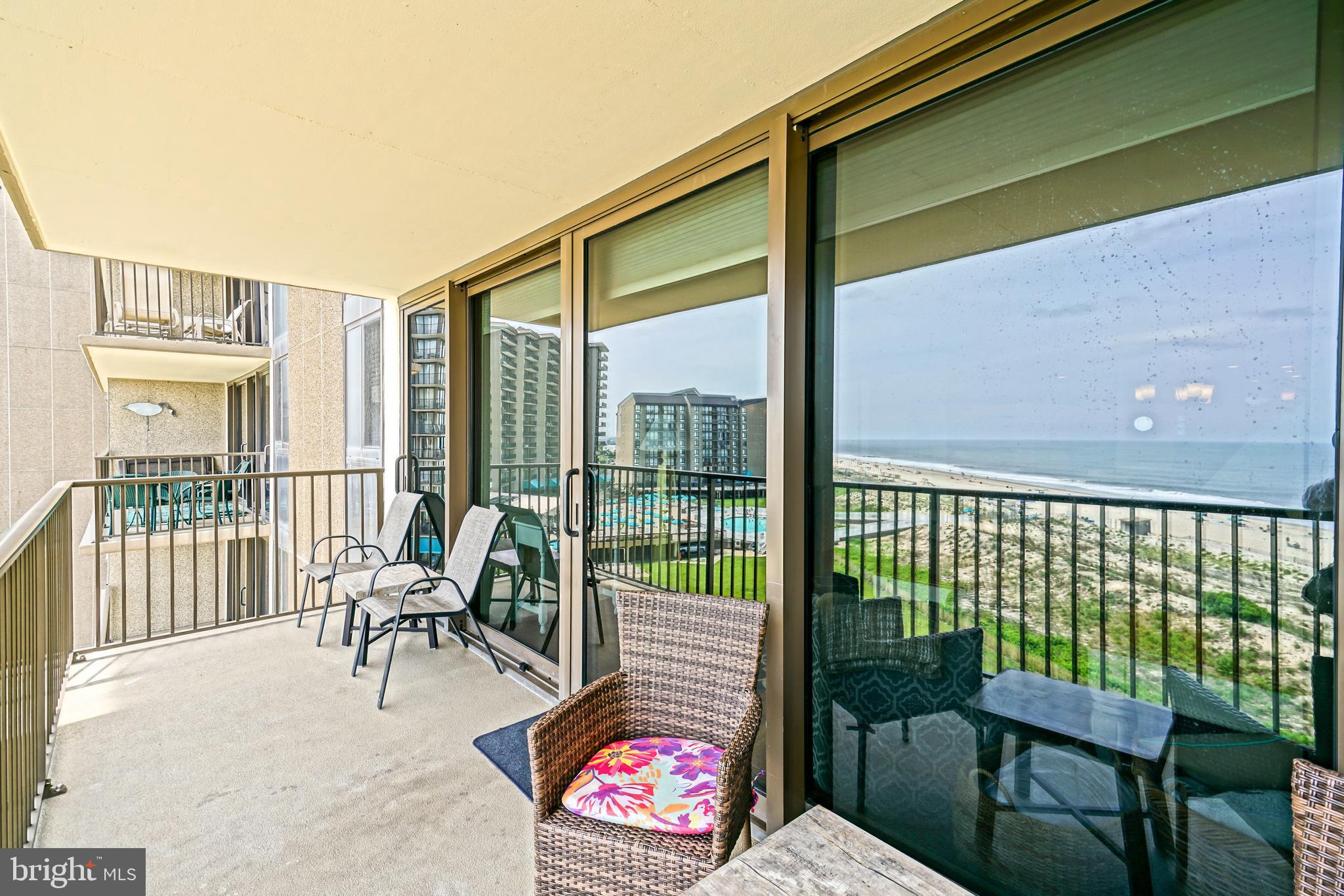 604 Dover House Road, Unit 604S Bethany Beach, DE 19930 - Photo 8 of 43 a balcony with furniture