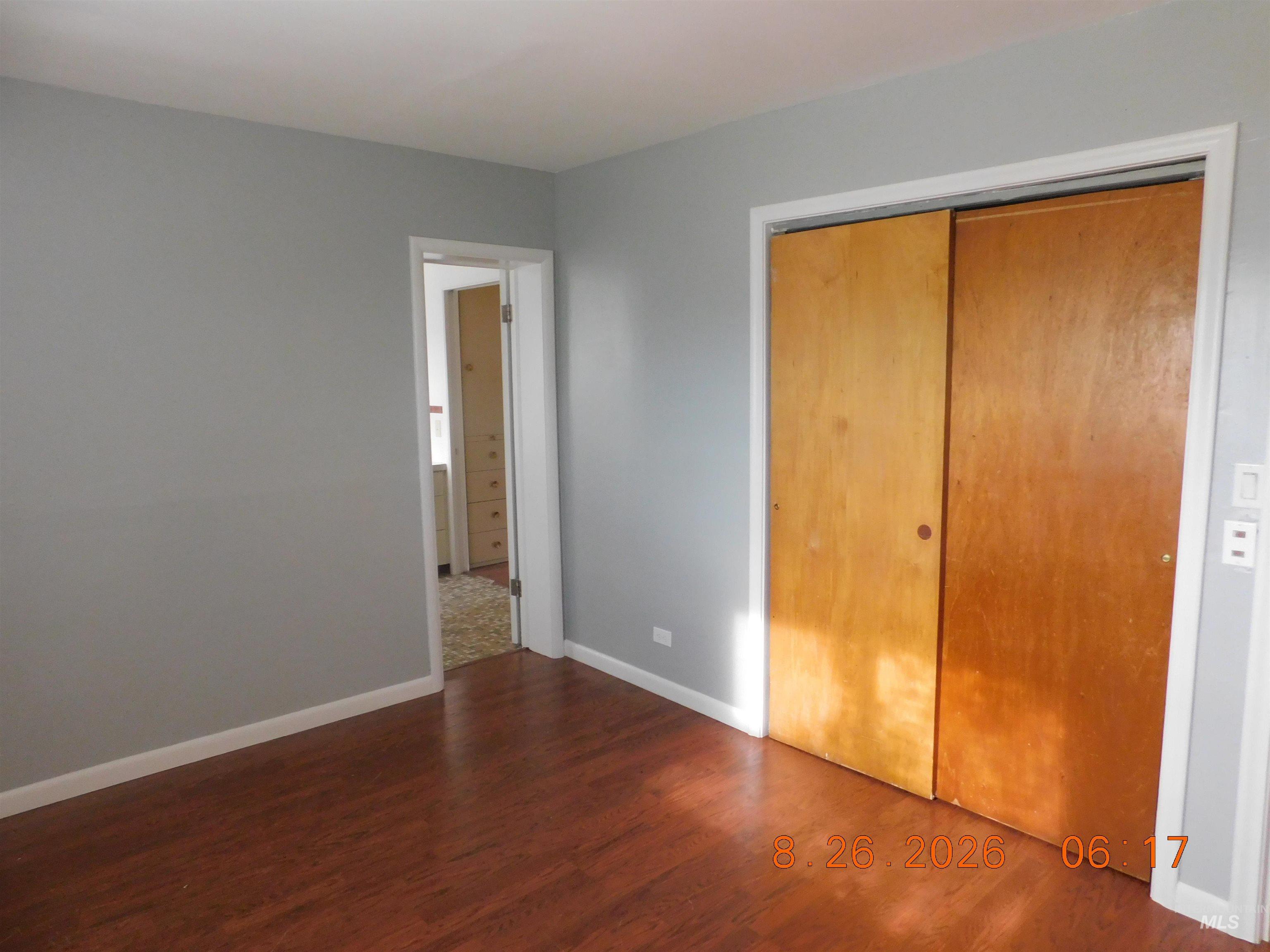 2115 North Galena Road Council, ID 83612 - Photo 15 of 18 Hardwood-finish flooring, light gray wall paint, and white trim accents