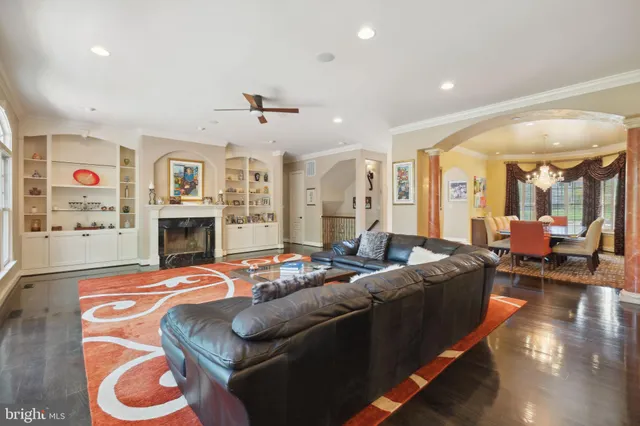 a view of staircase with wooden floor and a potted plant