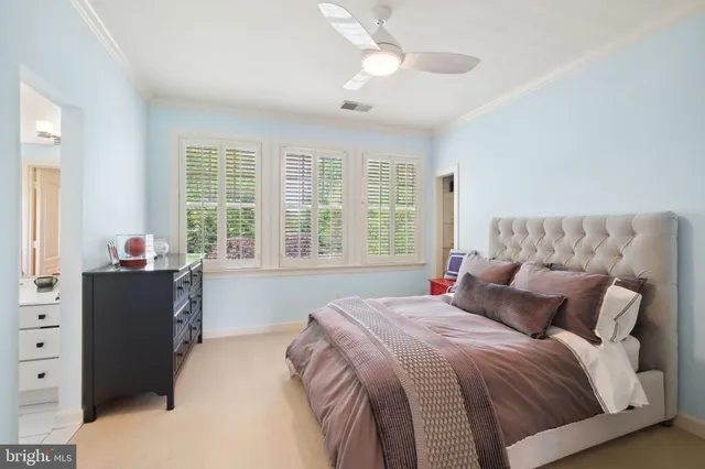 a balcony with furniture and wooden floor
