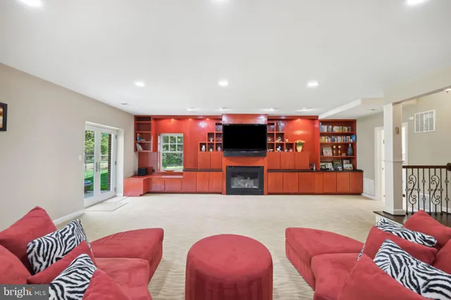 a front view of a house with a garden and yard