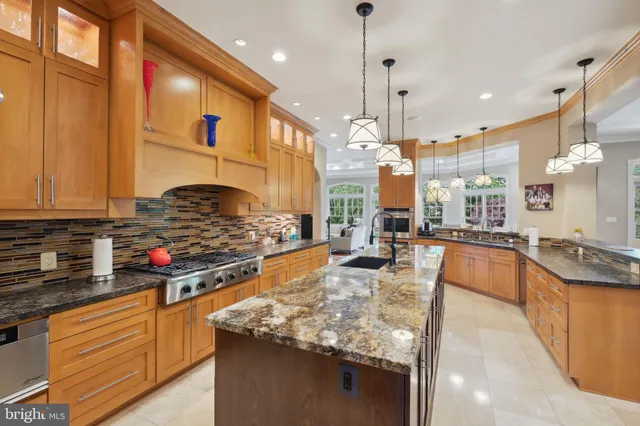 a living room with fireplace furniture and a fireplace