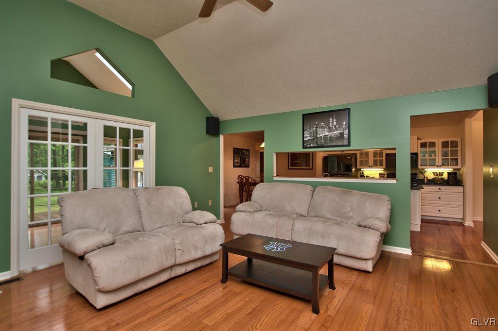 1362 Slutter Road Pocono Lake, PA 18347 - Photo 7 of 41 a living room with furniture and a flat screen tv