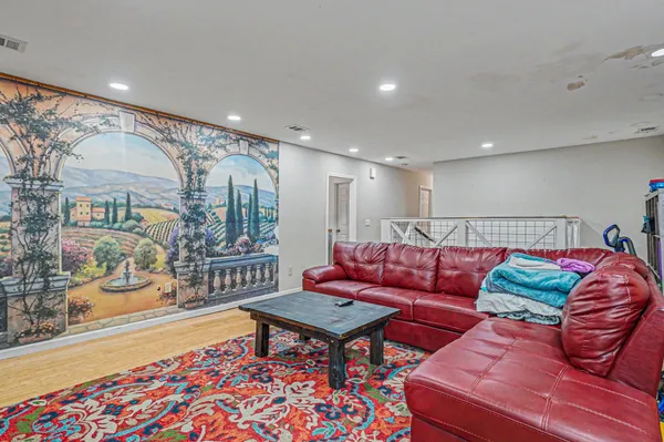 a bedroom with a bed and a table in it
