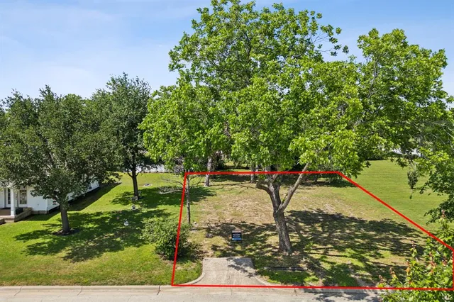 a view of a backyard of a house