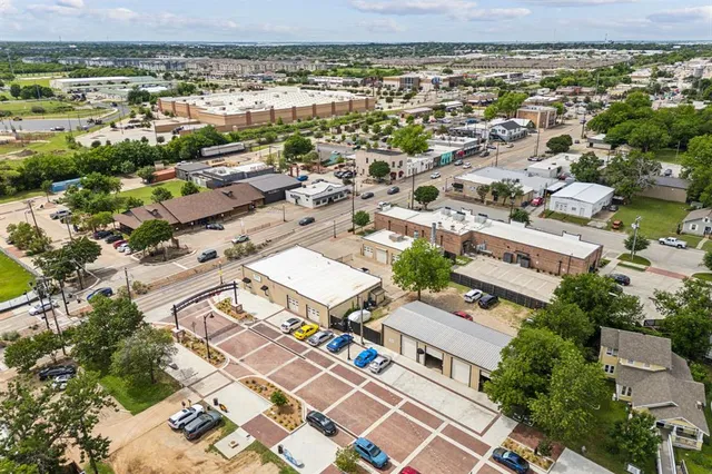 an aerial view of residential building with parking space