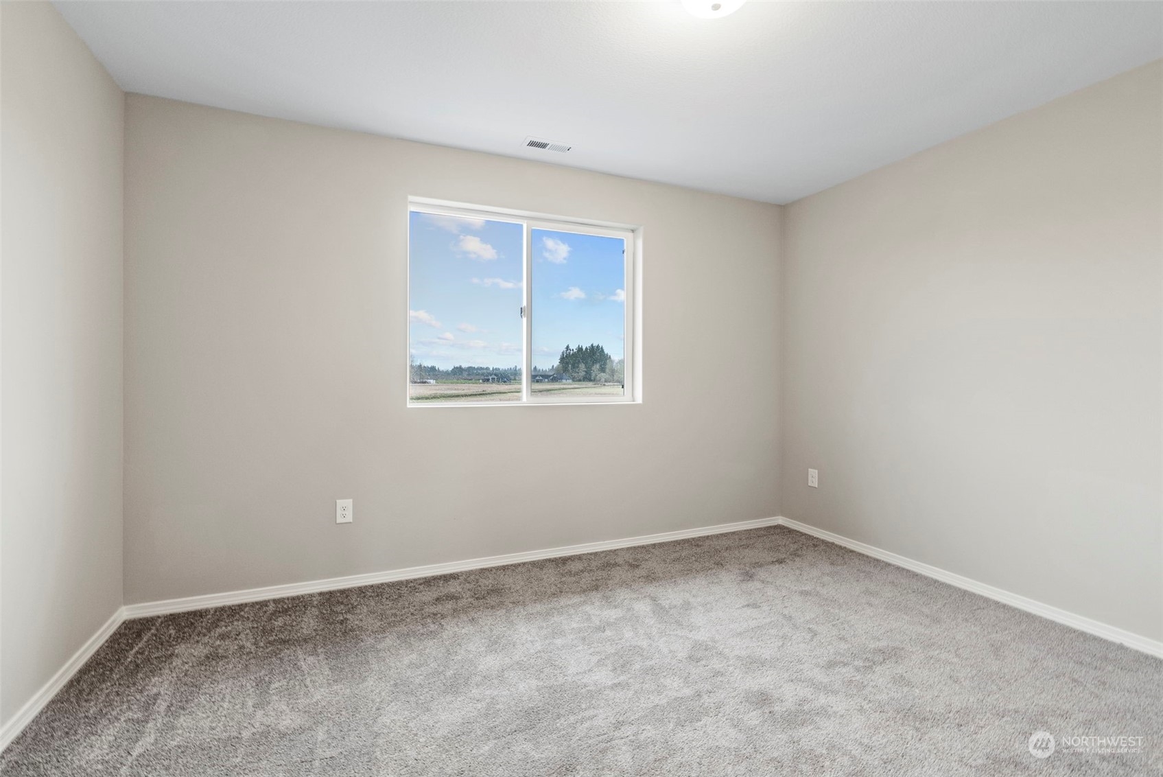 607 Tauscher Road Chehalis, WA 98532 - Photo 13 of 25 a view of an empty room with a window