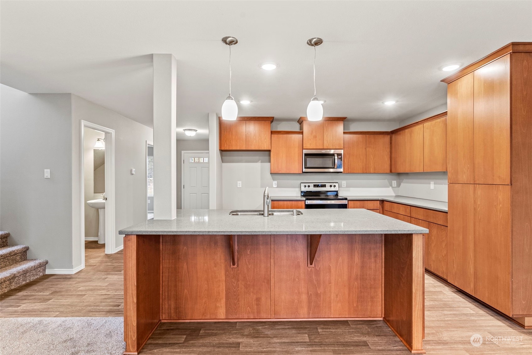 607 Tauscher Road Chehalis, WA 98532 - Photo 5 of 25 a kitchen with stainless steel appliances granite countertop a sink a stove and a refrigerator