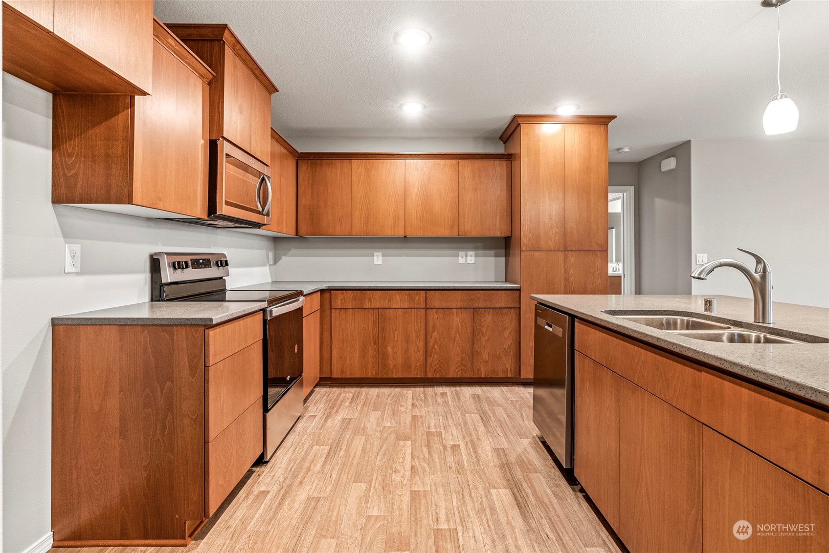 607 Tauscher Road Chehalis, WA 98532 - Photo 7 of 25 a kitchen with stainless steel appliances granite countertop a sink and cabinets