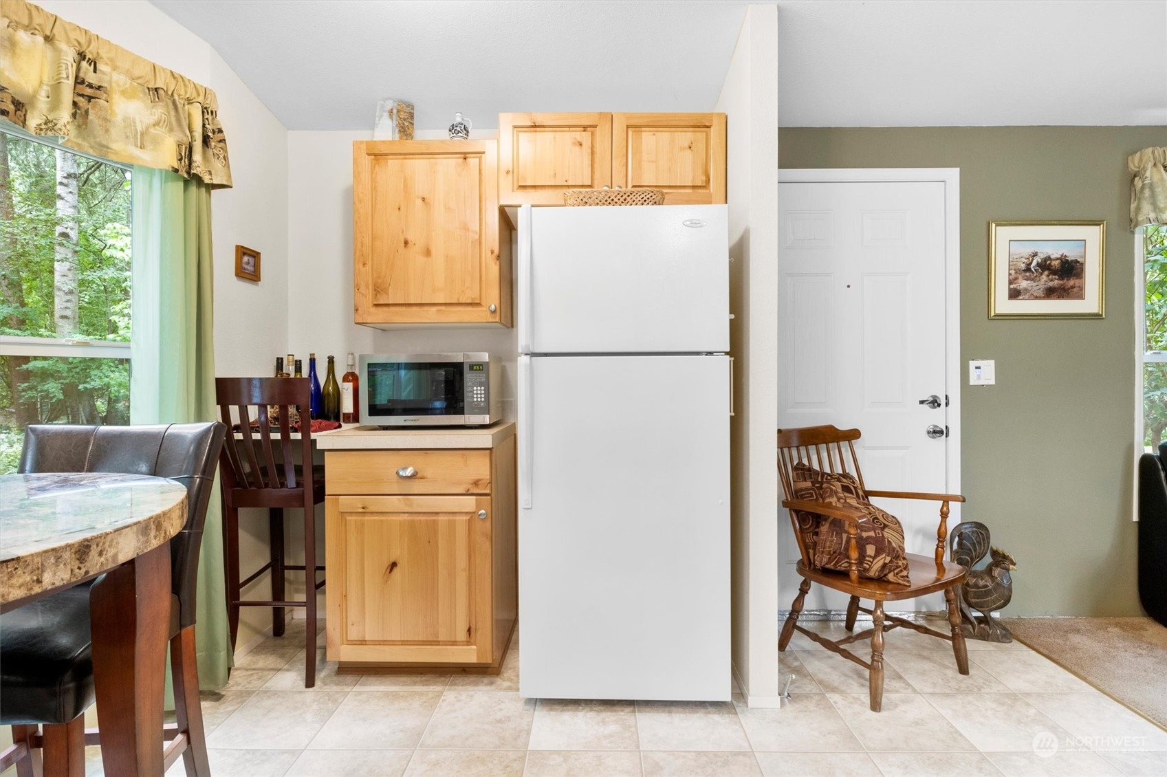 8351 Custer School Road Custer, WA 98240 - Photo 23 of 38 a kitchen with a refrigerator and a stove