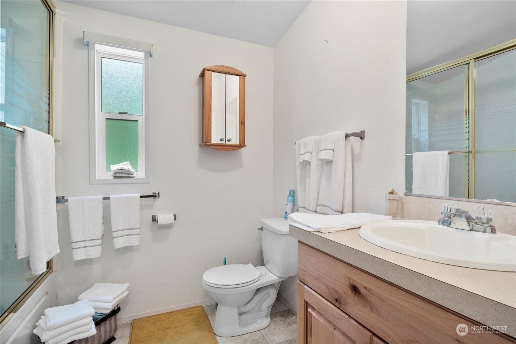 8351 Custer School Road Custer, WA 98240 - Photo 26 of 38 a bathroom with a granite countertop toilet sink and mirror
