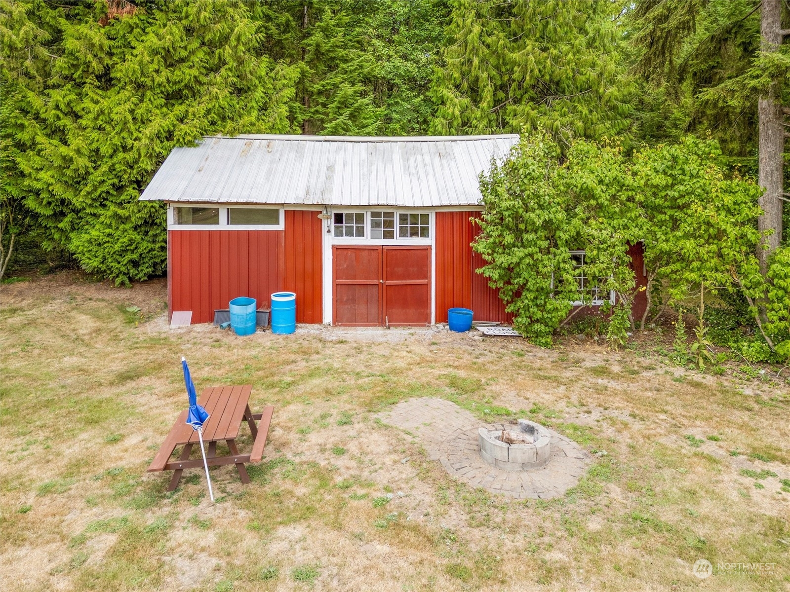 8351 Custer School Road Custer, WA 98240 - Photo 9 of 38 a backyard of a house with yard and garage
