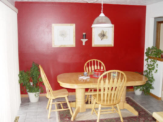 5863 Rural Edge Drive Roscoe, IL 61073 - Photo 5 of 11 a view of a dining room with furniture and wooden floor
