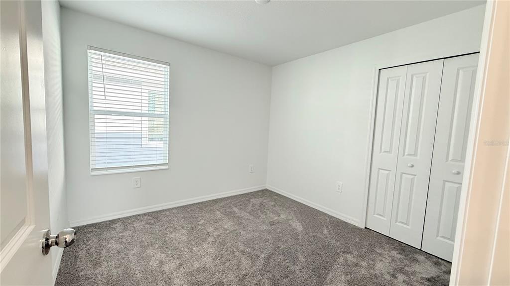1179 Tyler Loop Lake Wales, FL 33859 - Photo 13 of 25 an empty room with windows