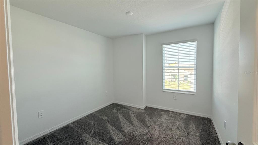 1179 Tyler Loop Lake Wales, FL 33859 - Photo 15 of 25 a view of an empty room and window