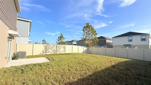 a view of a backyard with a garden