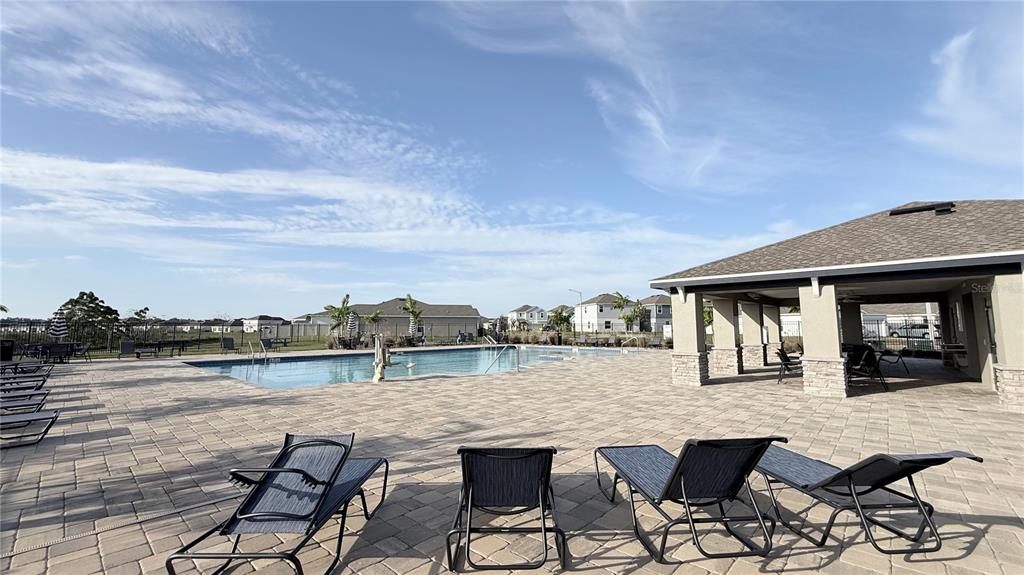 1179 Tyler Loop Lake Wales, FL 33859 - Photo 25 of 25 a view of a lake with outdoor seating space