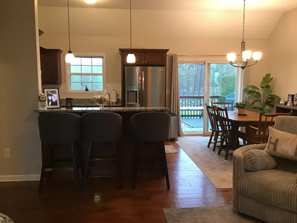 a view of a dining room with furniture window and outside view