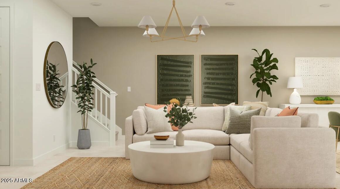 16386 West Weeping Willow Road Surprise, AZ 85387 - Photo 7 of 22 a living room with furniture and a potted plant