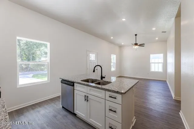 a view of front door with chandelier