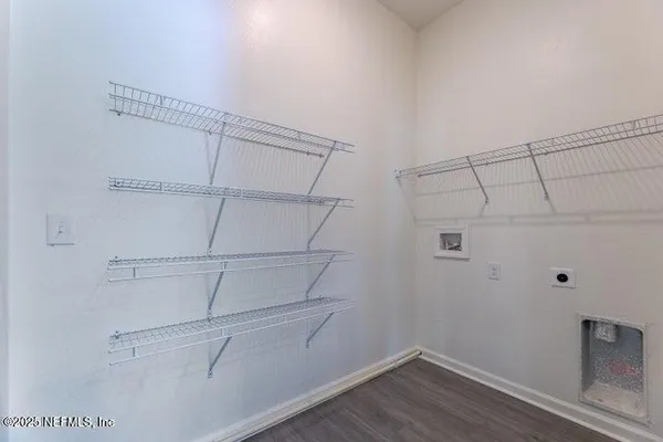 a view of a room with racks on the wall