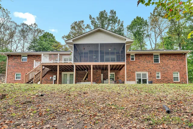 a house with trees in the background