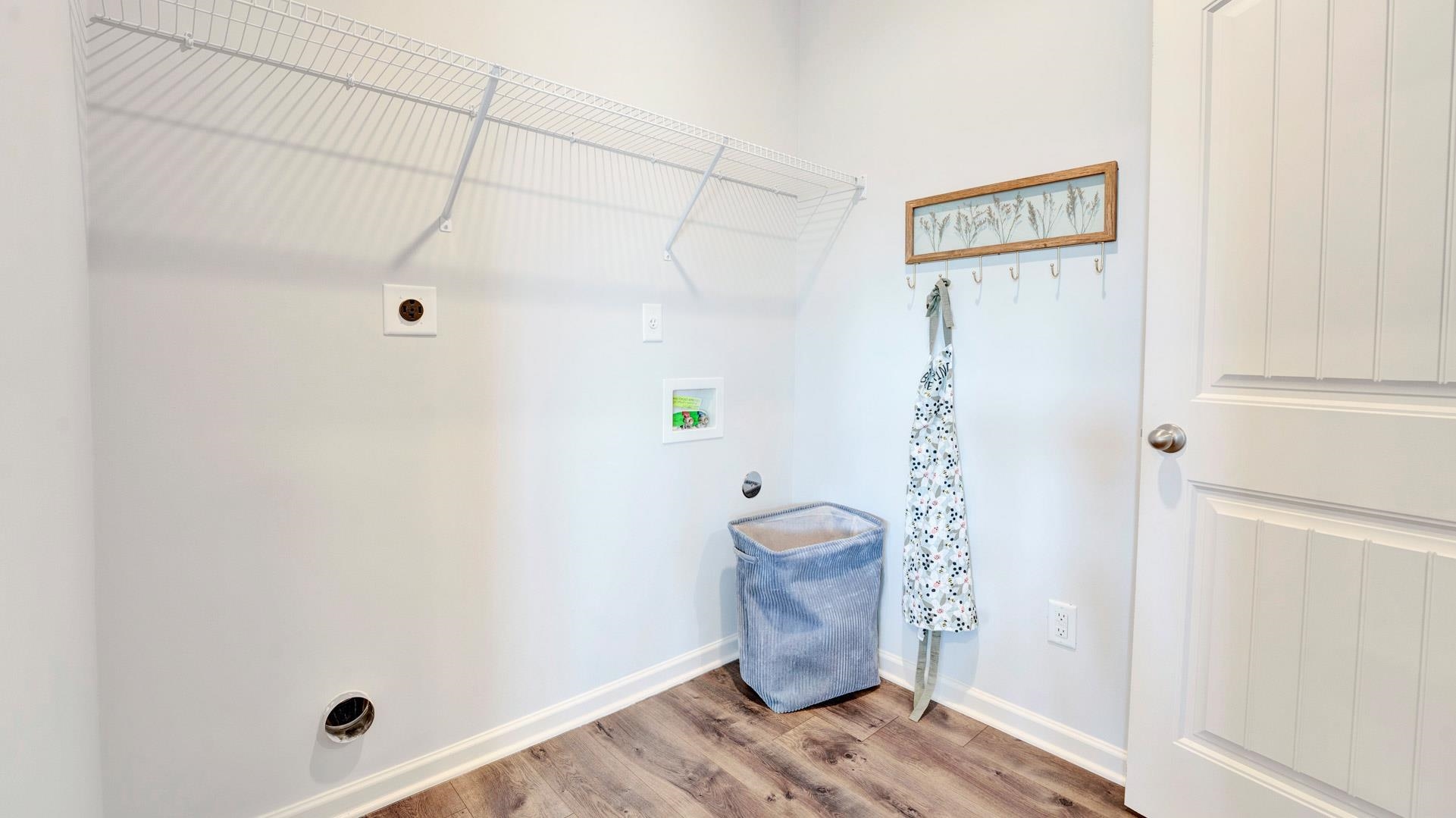 1020 Mewborn Farm Road Oakland, TN 38060 - Photo 23 of 36 Laundry room featuring hookup for an electric dryer, light wood-style floors, and washer hookup
