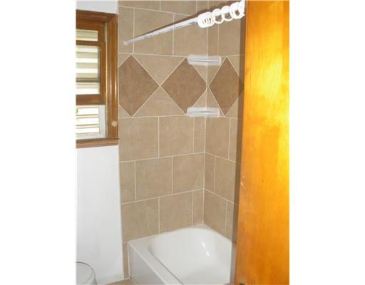 5311 Lexington Road Corpus Christi, TX 78412 - Photo 7 of 7 a bathroom with a shower and a sink