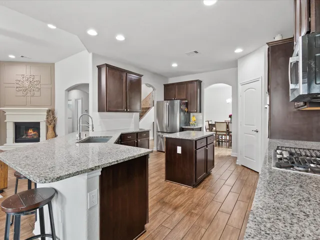 a bedroom with a bed and a television