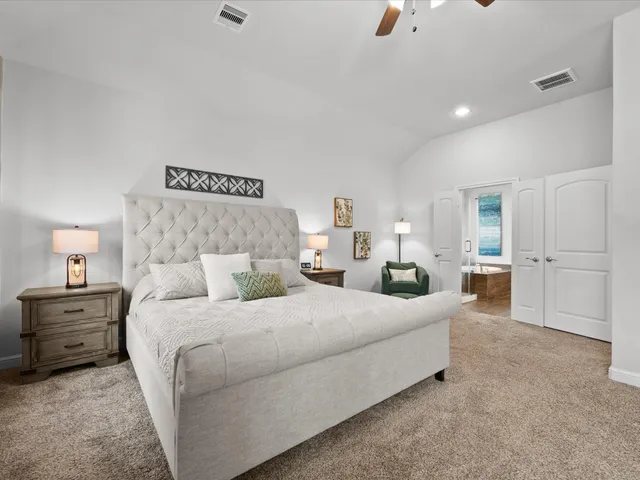a view of a livingroom with a ceiling fan