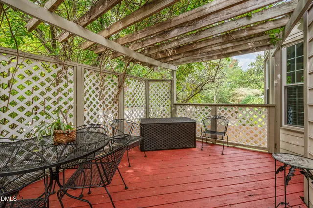a view of a patio with wooden floor