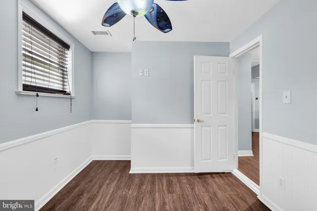 a utility room with sink dryer and washer