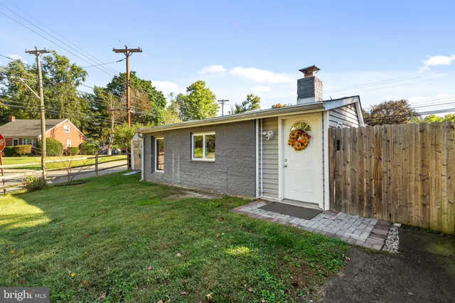 a view of a backyard with a garden