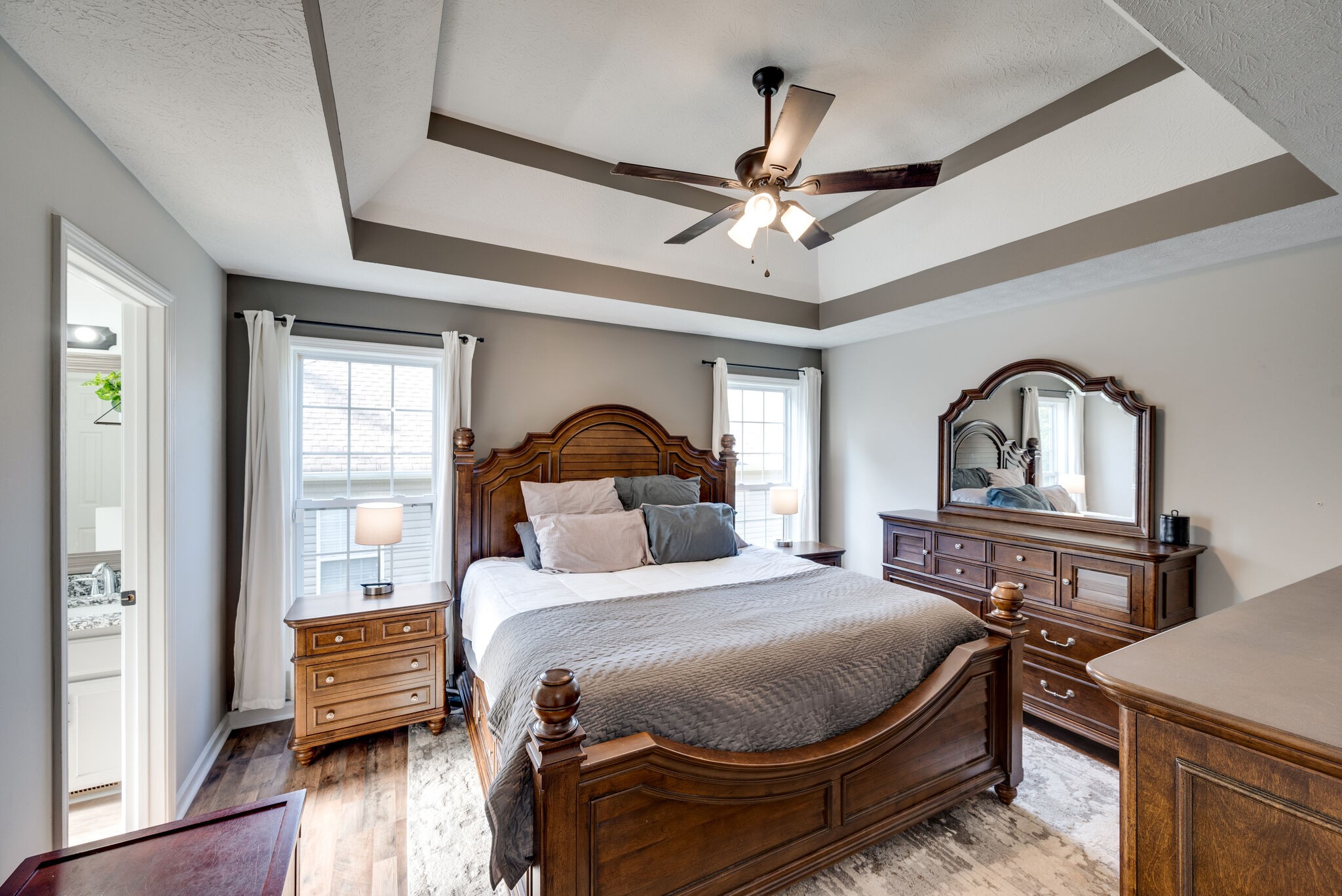 307 Red Bud Court Springfield, TN 37172 - Photo 18 of 33 a bedroom with a bed wooden floor and window