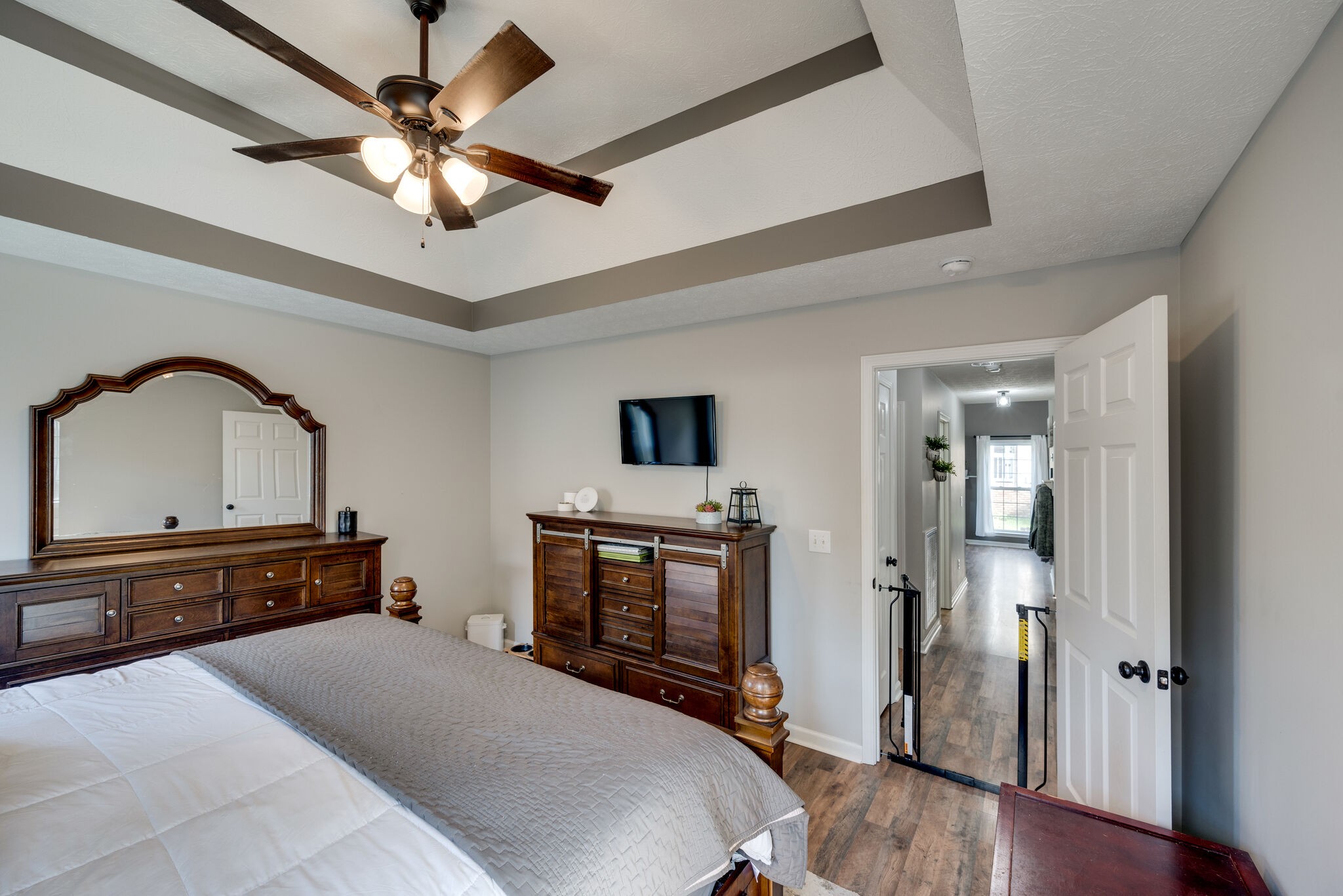 307 Red Bud Court Springfield, TN 37172 - Photo 19 of 33 a bedroom with a bed and a flat screen tv