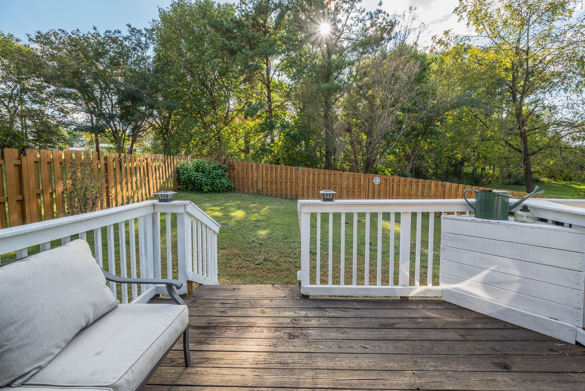 307 Red Bud Court Springfield, TN 37172 - Photo 27 of 33 a balcony with wooden floor and yard in the back
