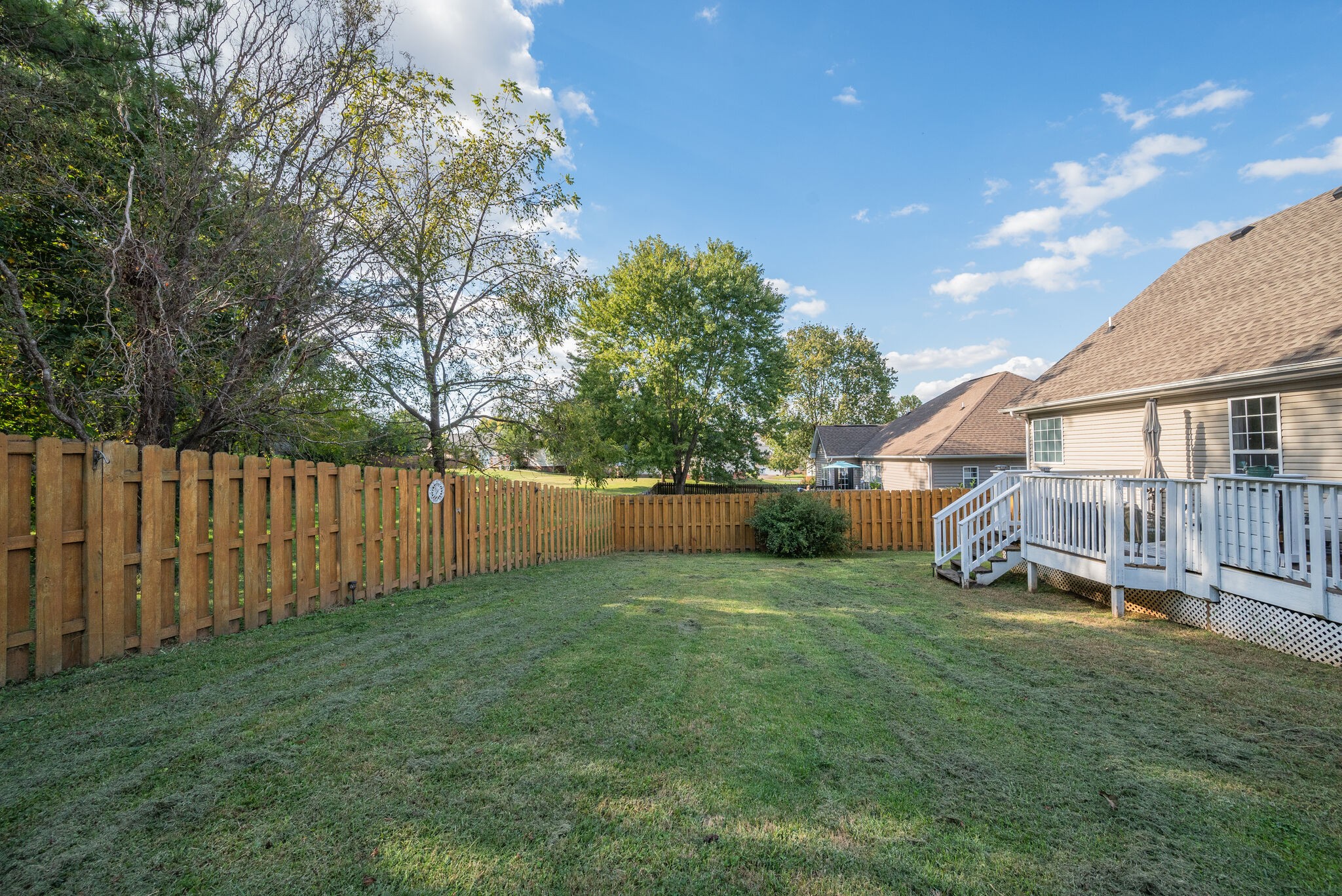 307 Red Bud Court Springfield, TN 37172 - Photo 33 of 33 a view of a backyard with a small cabin and wooden fence