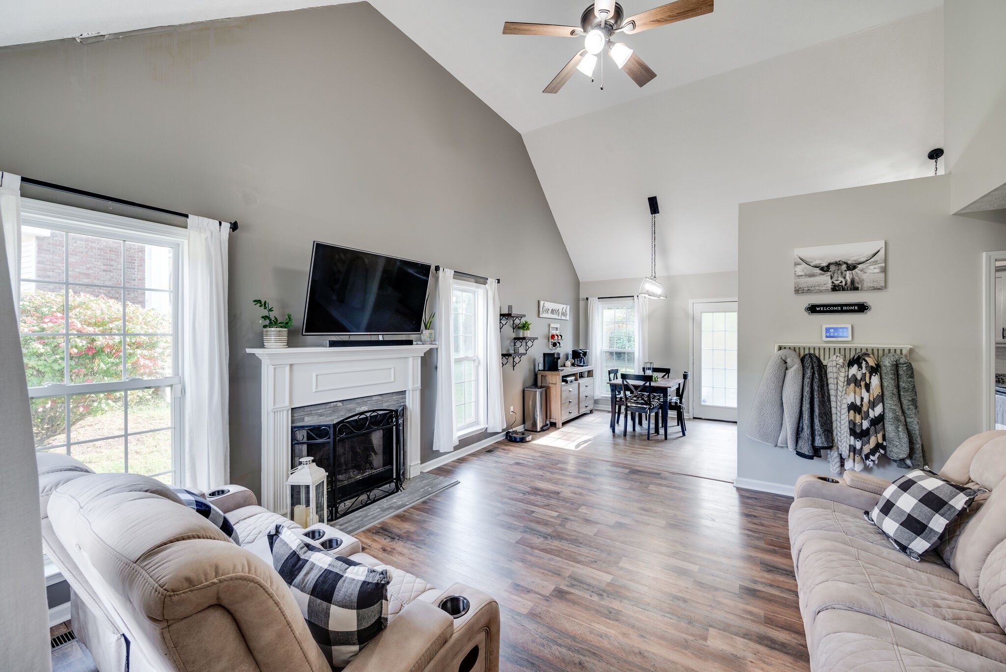 307 Red Bud Court Springfield, TN 37172 - Photo 5 of 33 a living room with furniture a fireplace and a flat screen tv
