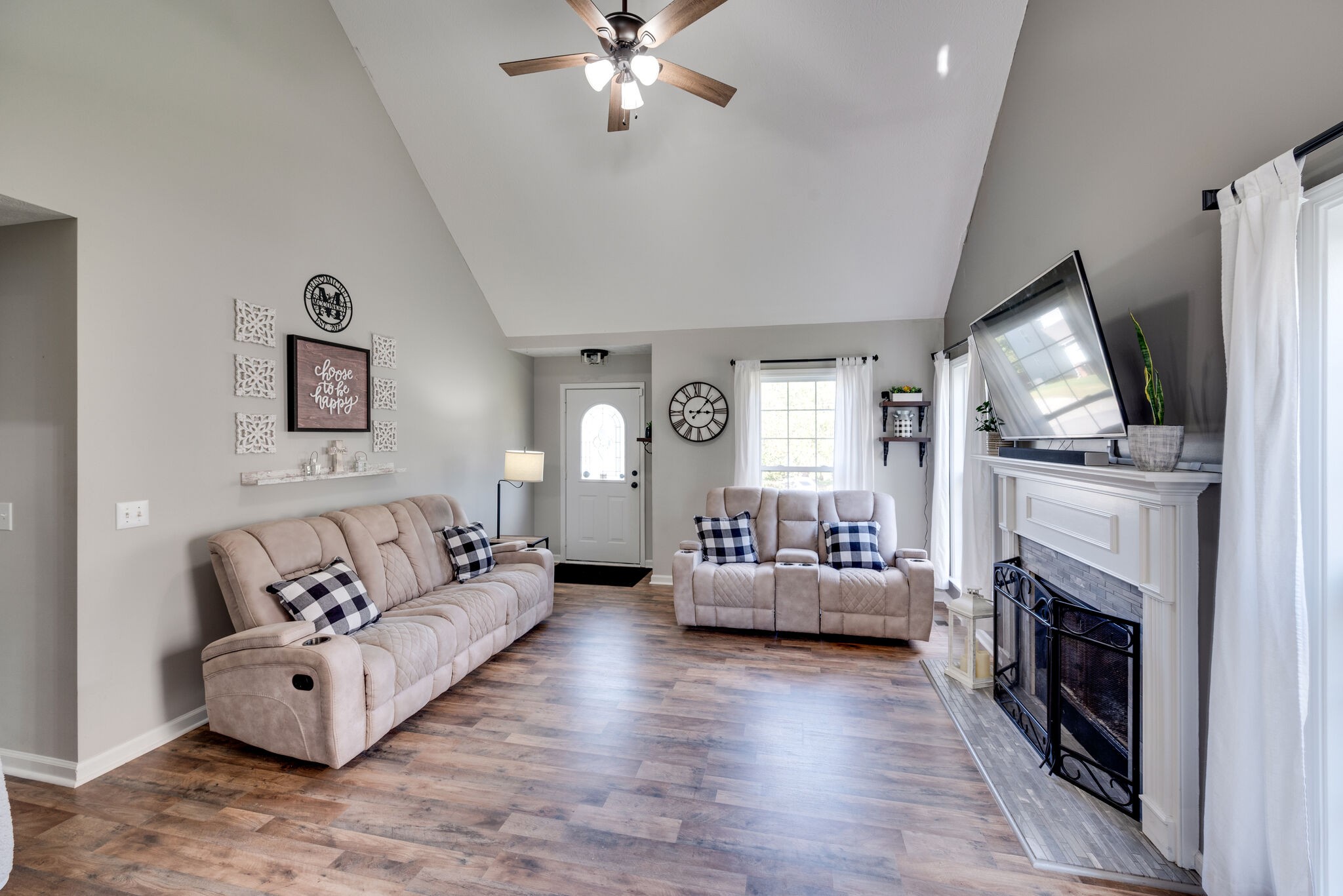 307 Red Bud Court Springfield, TN 37172 - Photo 6 of 33 a living room with furniture and a fireplace