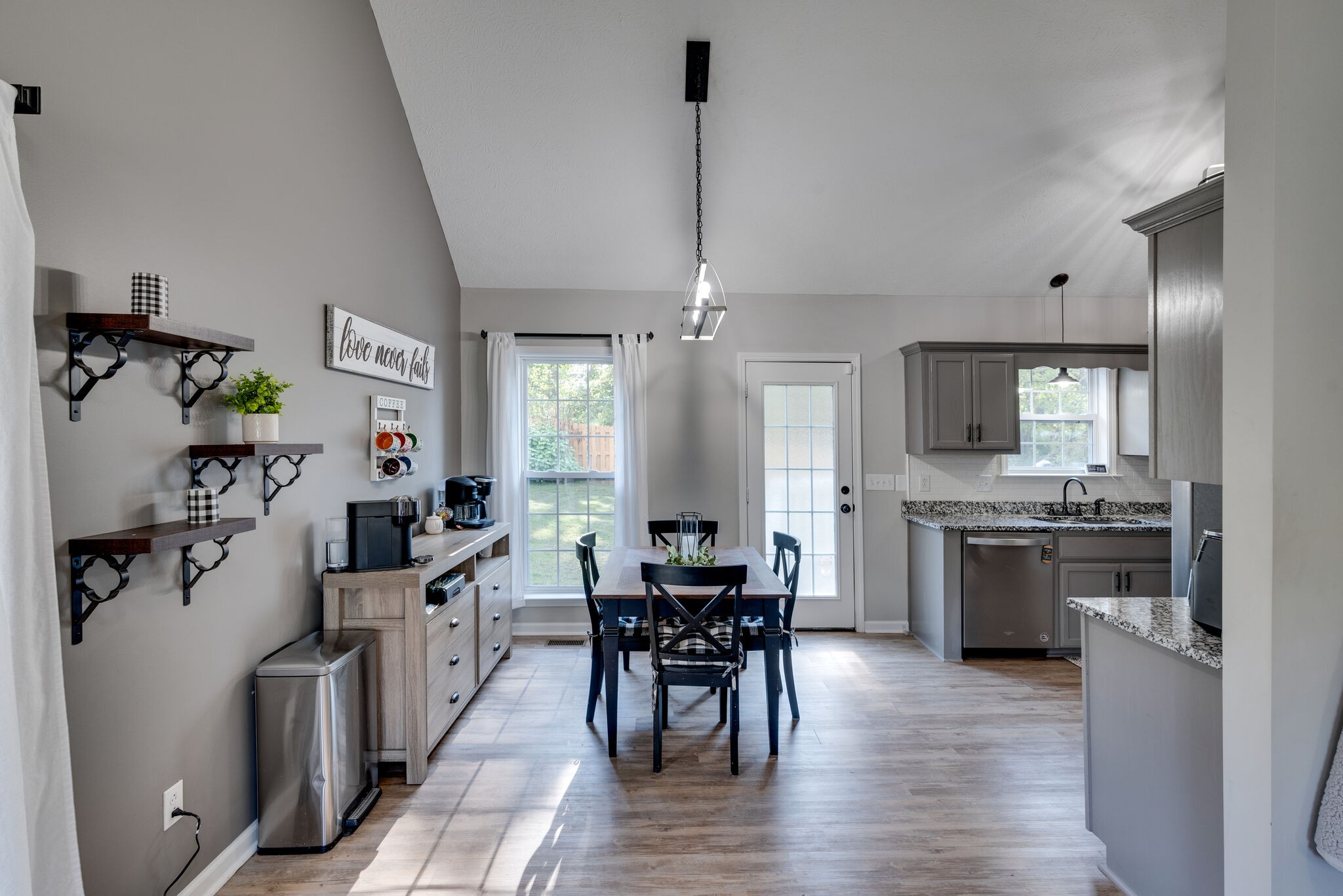 307 Red Bud Court Springfield, TN 37172 - Photo 8 of 33 a kitchen with a table chairs stove and cabinets