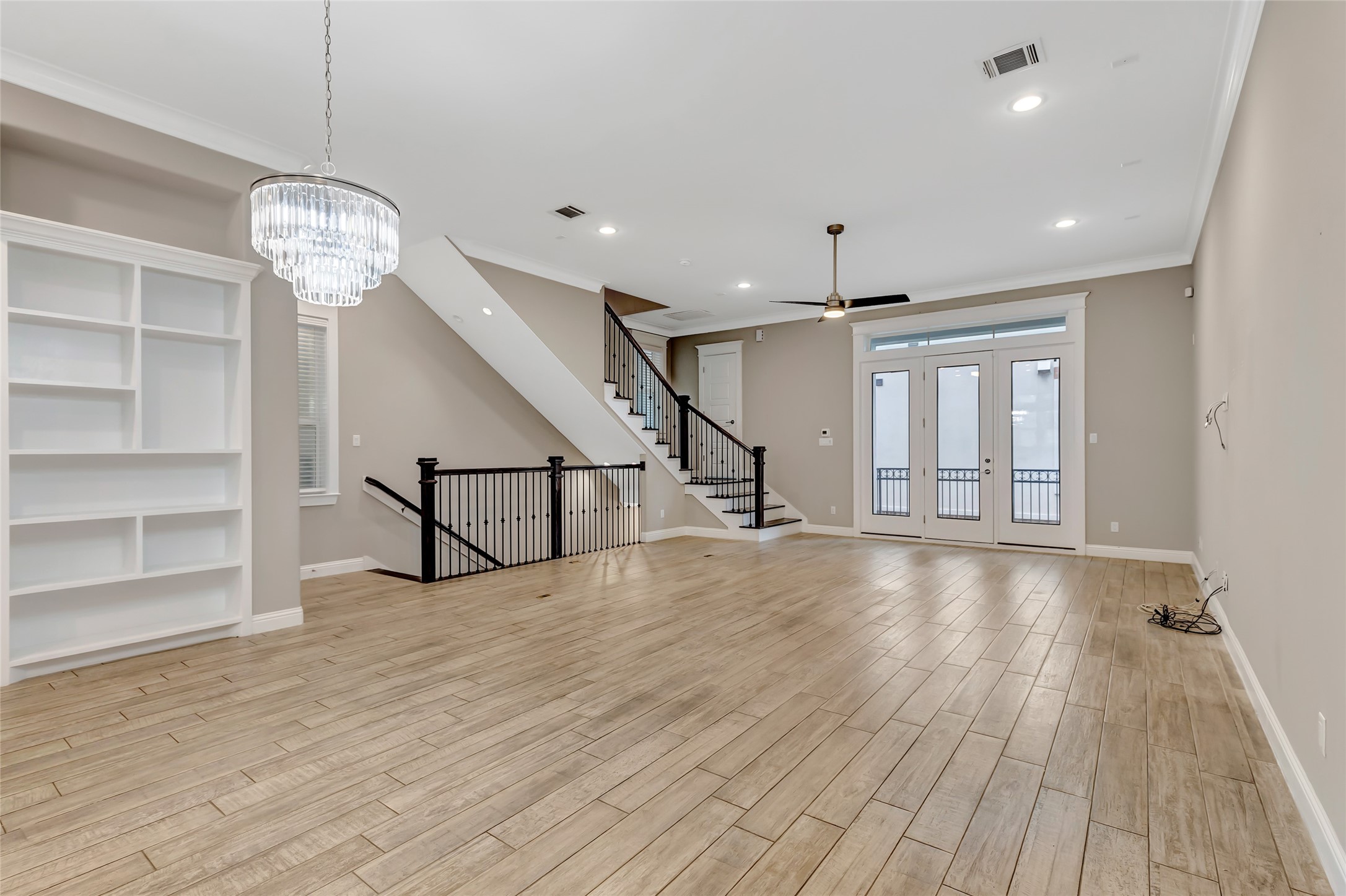 2810 Princeton Street Houston, TX 77009 - Photo 11 of 31 a view of an empty room with a window and wooden floor