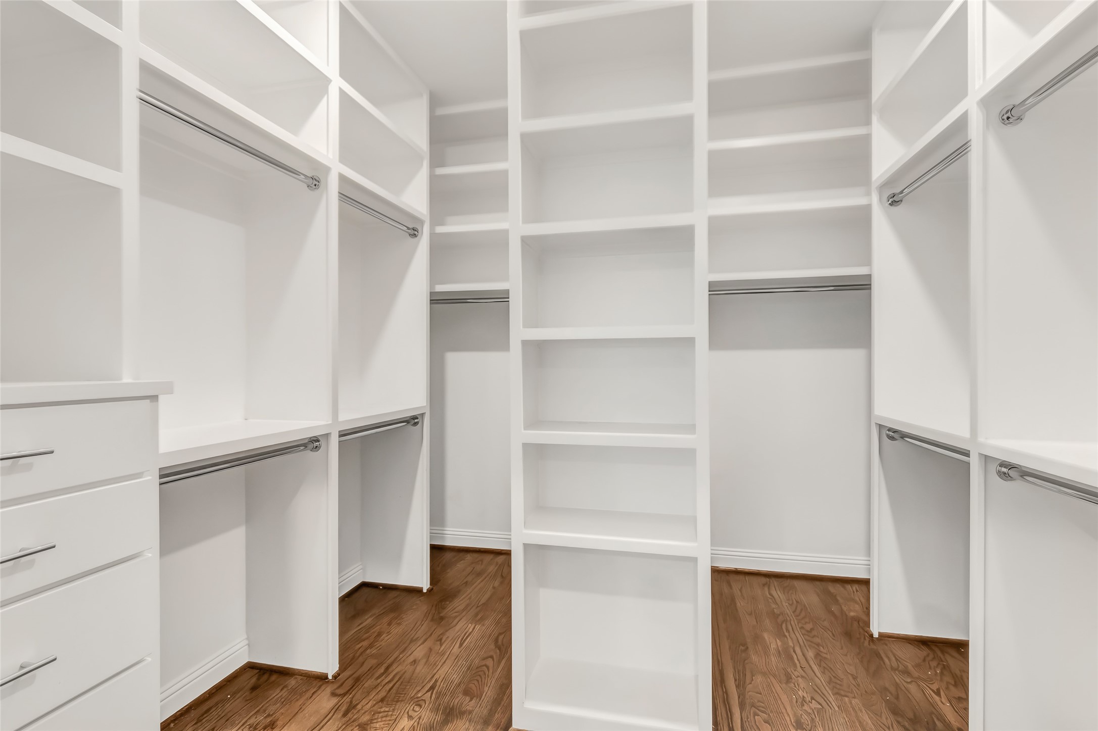 2810 Princeton Street Houston, TX 77009 - Photo 19 of 31 a view of walk in closet with empty racks