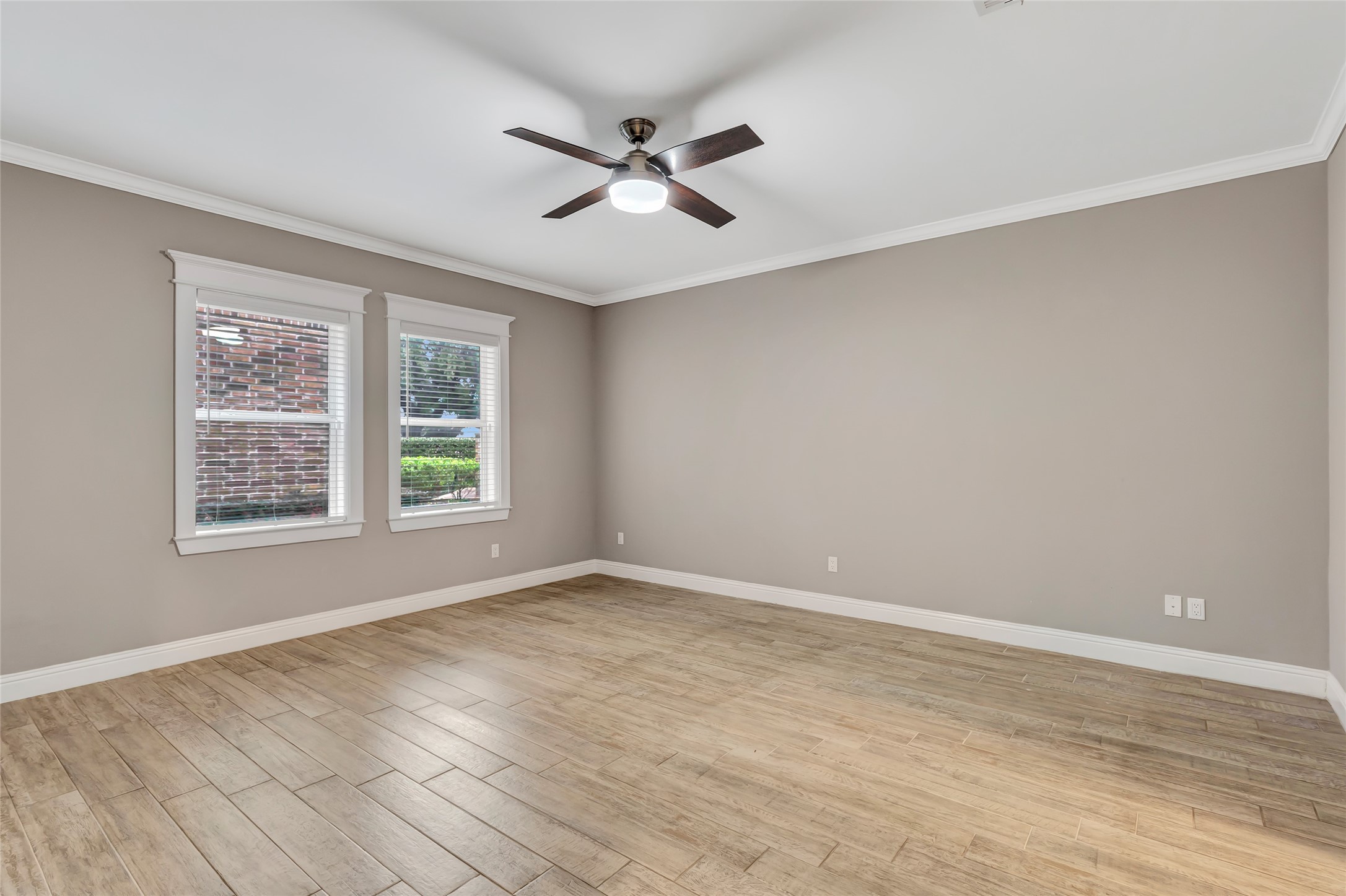 2810 Princeton Street Houston, TX 77009 - Photo 20 of 31 wooden floor in an empty room with a window