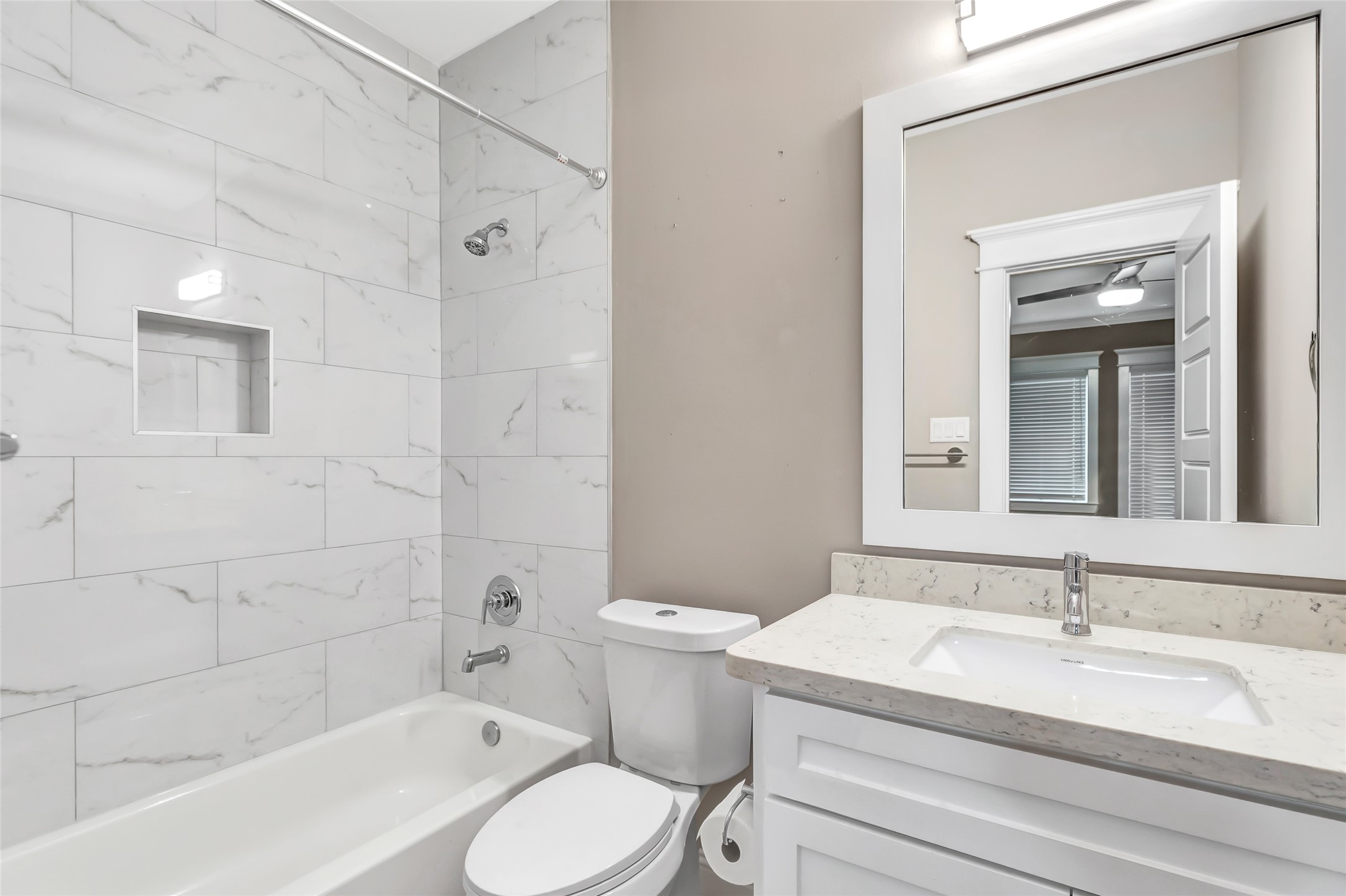 2810 Princeton Street Houston, TX 77009 - Photo 26 of 31 a bathroom with a sink toilet vanity and shower