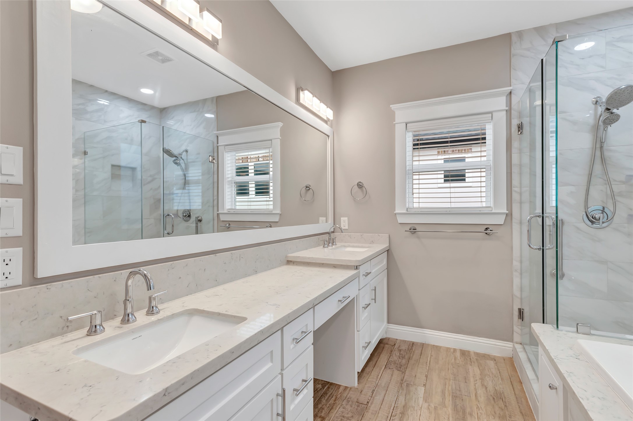 2810 Princeton Street Houston, TX 77009 - Photo 28 of 31 a bathroom with a granite countertop sink mirror and a shower