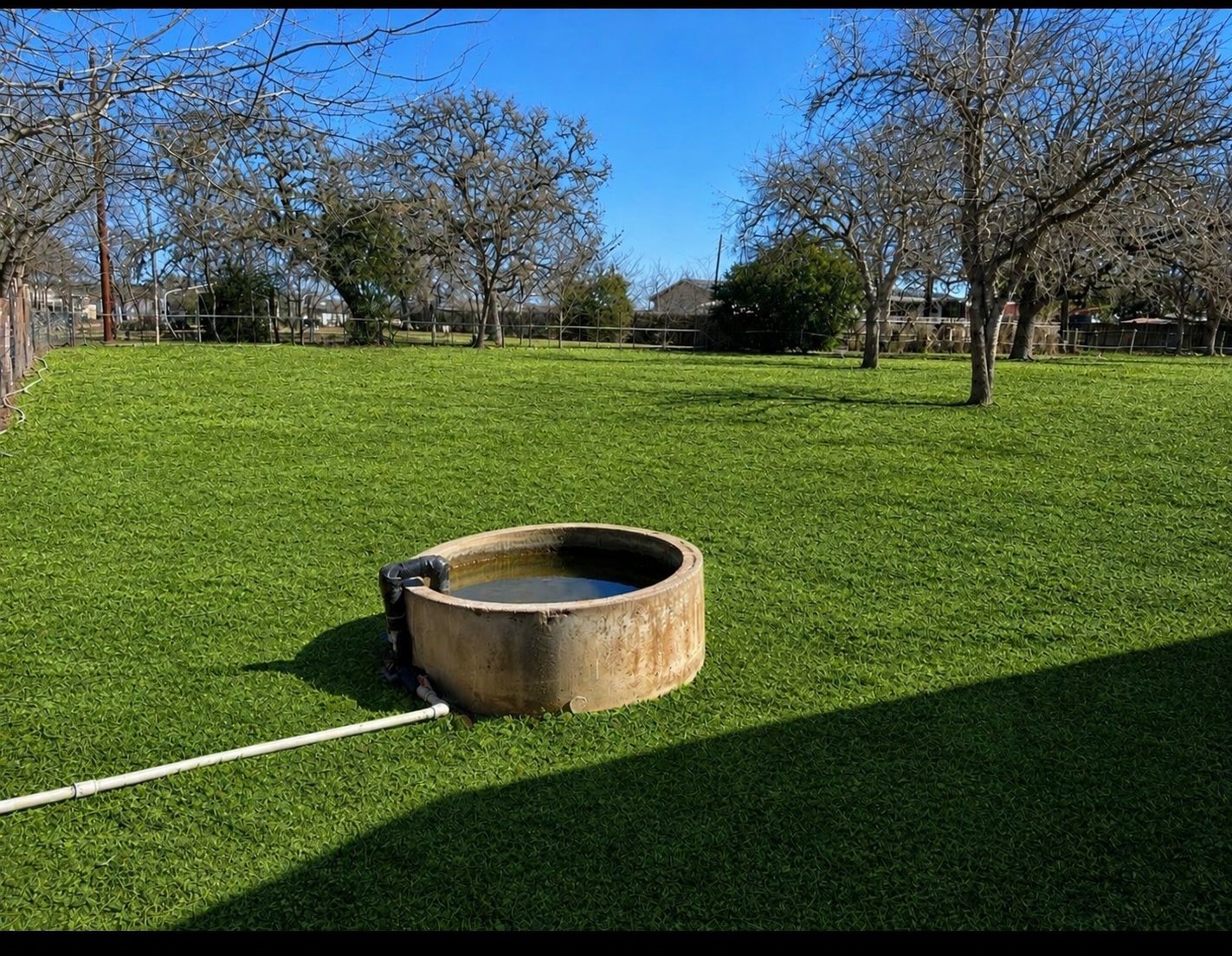 680 Stringtown Road Medina, TX 78055 - Photo 20 of 22 a view of a golf course with a garden