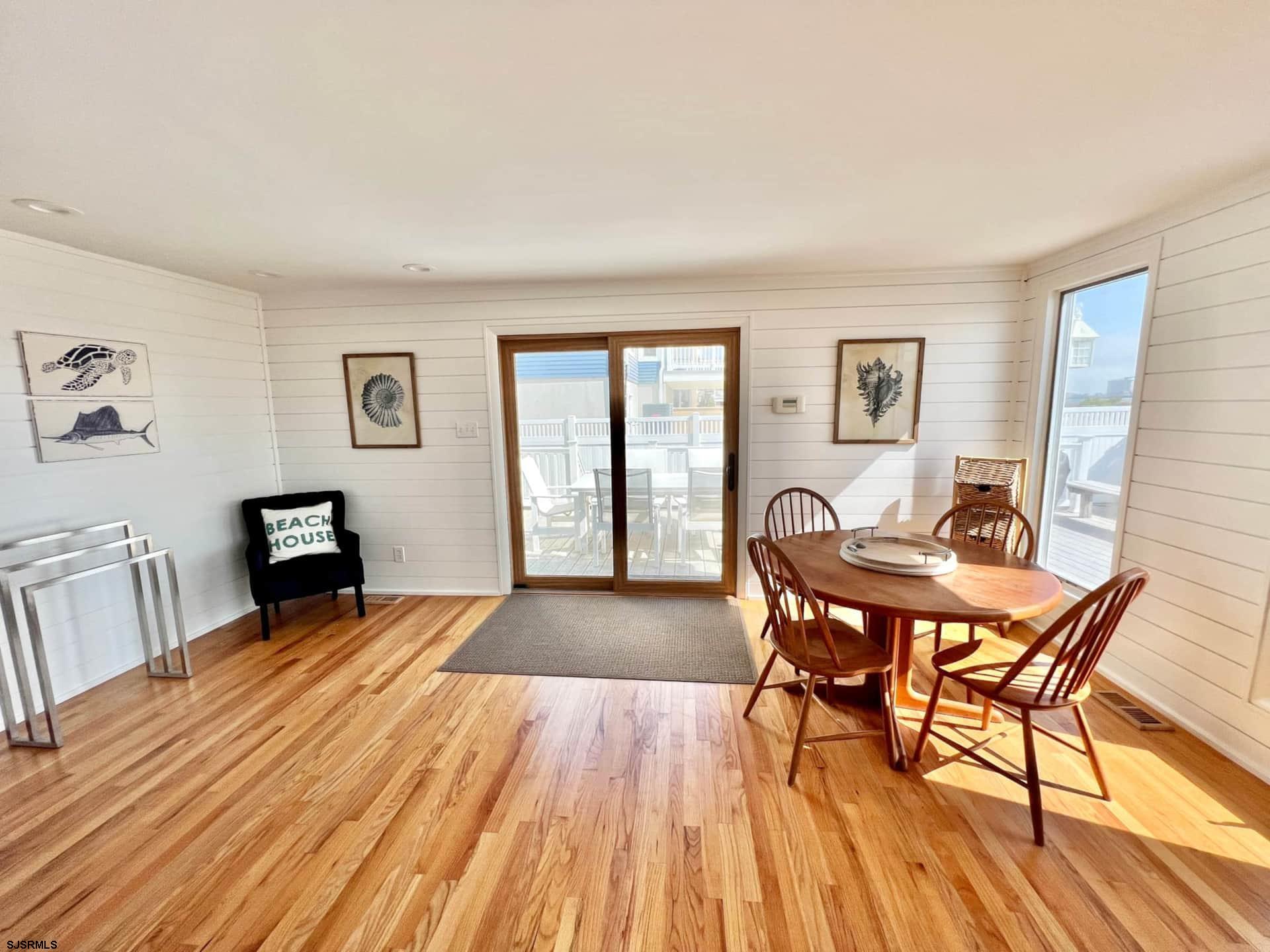 24 Ocean Drive West Brigantine, NJ 08203 - Photo 15 of 48 a view of a livingroom with furniture and wooden floor