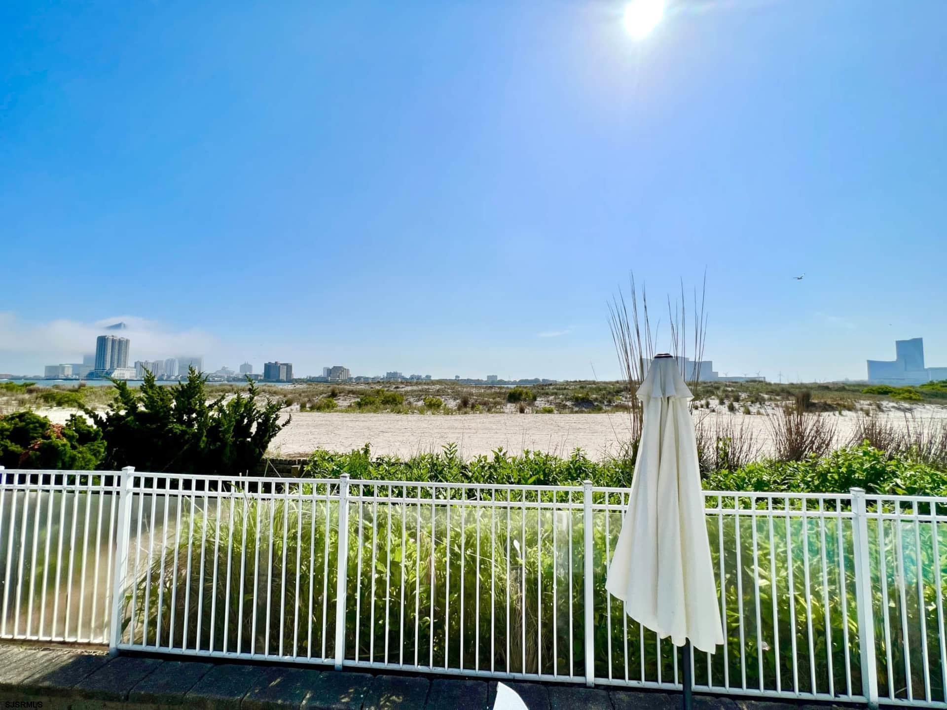 24 Ocean Drive West Brigantine, NJ 08203 - Photo 27 of 48 a view of a garden and lake