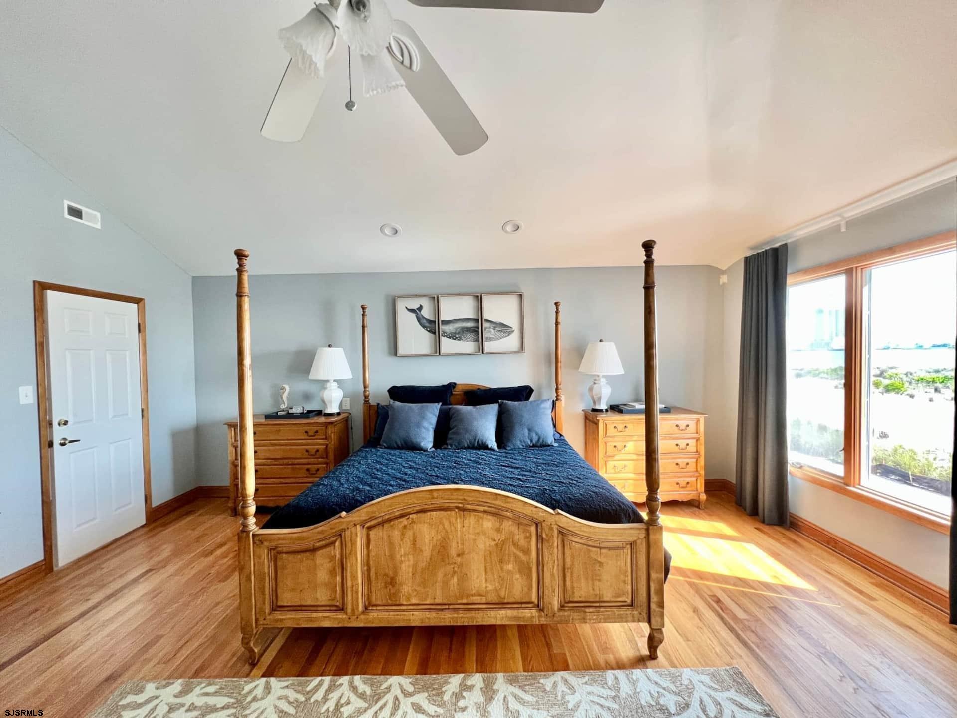24 Ocean Drive West Brigantine, NJ 08203 - Photo 44 of 48 a living room with furniture and wooden floor